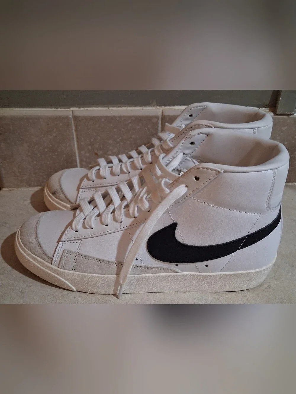 Nike Blazer Mid '77 vintage sneakers, bold black leather Swoosh